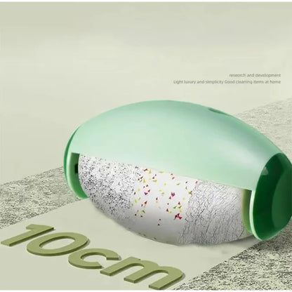 Reusable lint roller opened to show the sticky lint-collecting surface, approximately 10cm size